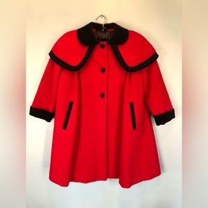 Beautiful Rothschild coat in red wool with black velvet trim.